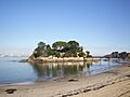 Praia de Portocovo e castelo de Santa Cruz