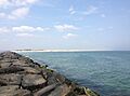 2013-08-21 13 08 32 View north-northwest from 700 feet into the Atlantic Ocean on the jetty along the north shore of Barnegat Inlet in Island Beach State Park