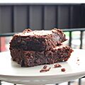 Brownie with crumbs on plate