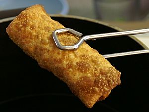 Archivo:CookbookEggrollTongs