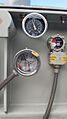 Pressure-vacuum gauge transformer