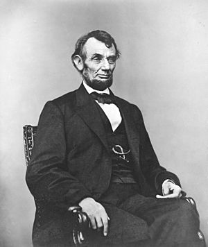 Archivo:Abraham Lincoln seated, Feb 9, 1864