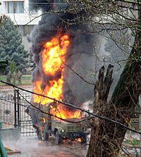 Archivo:Burning truck bishkek protests