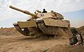Iraqi tank breaches obstacle 150322-A-BX700-054